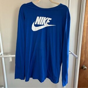 The Nike Tee athletic cut blue long sleeve with white graphic logo